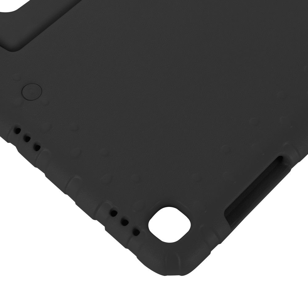 Black, textured corner of a device case with rounded edges and a hole.