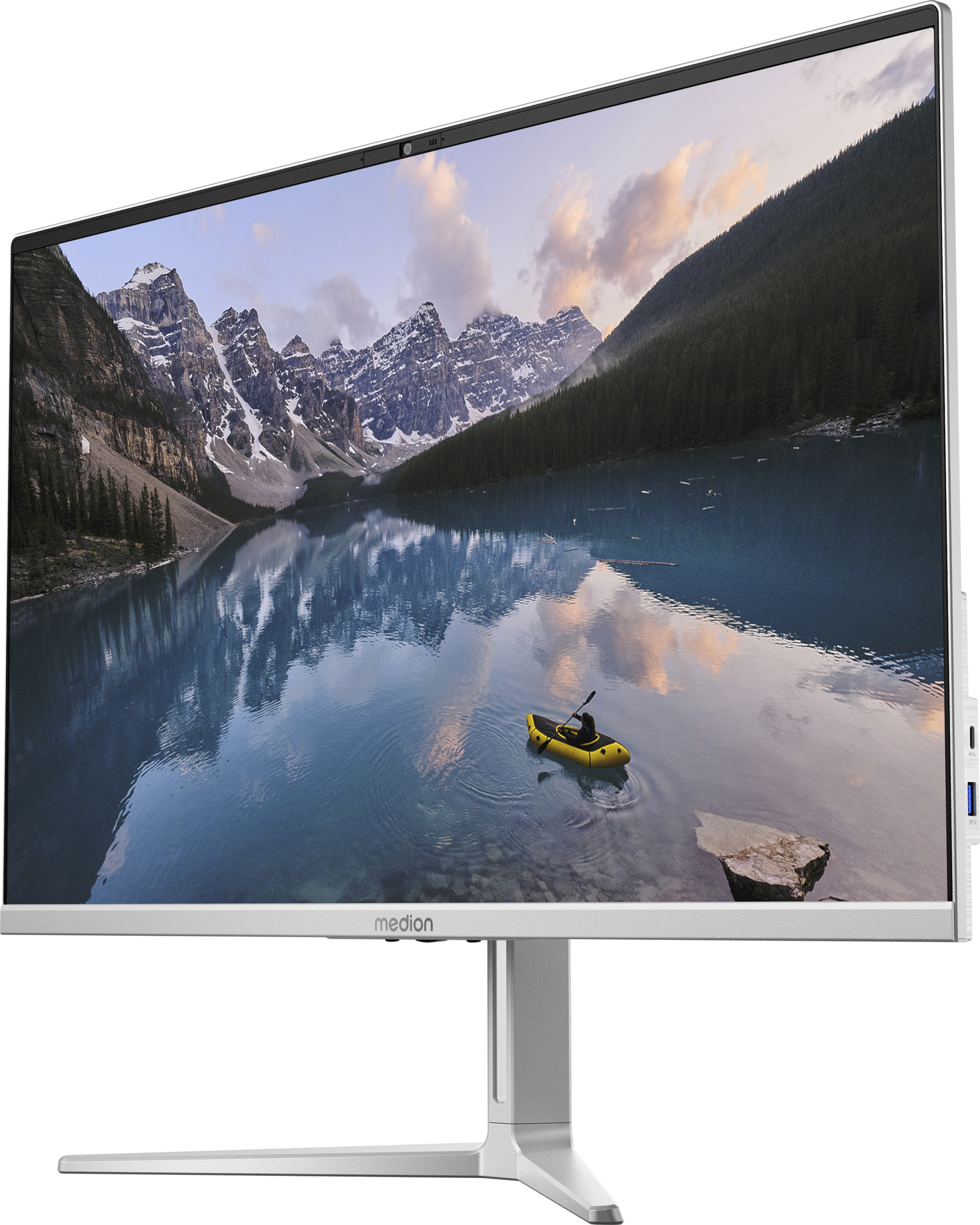 Ein silberner Computermonitor, der eine Landschaft mit See und Bergen zeigt.
