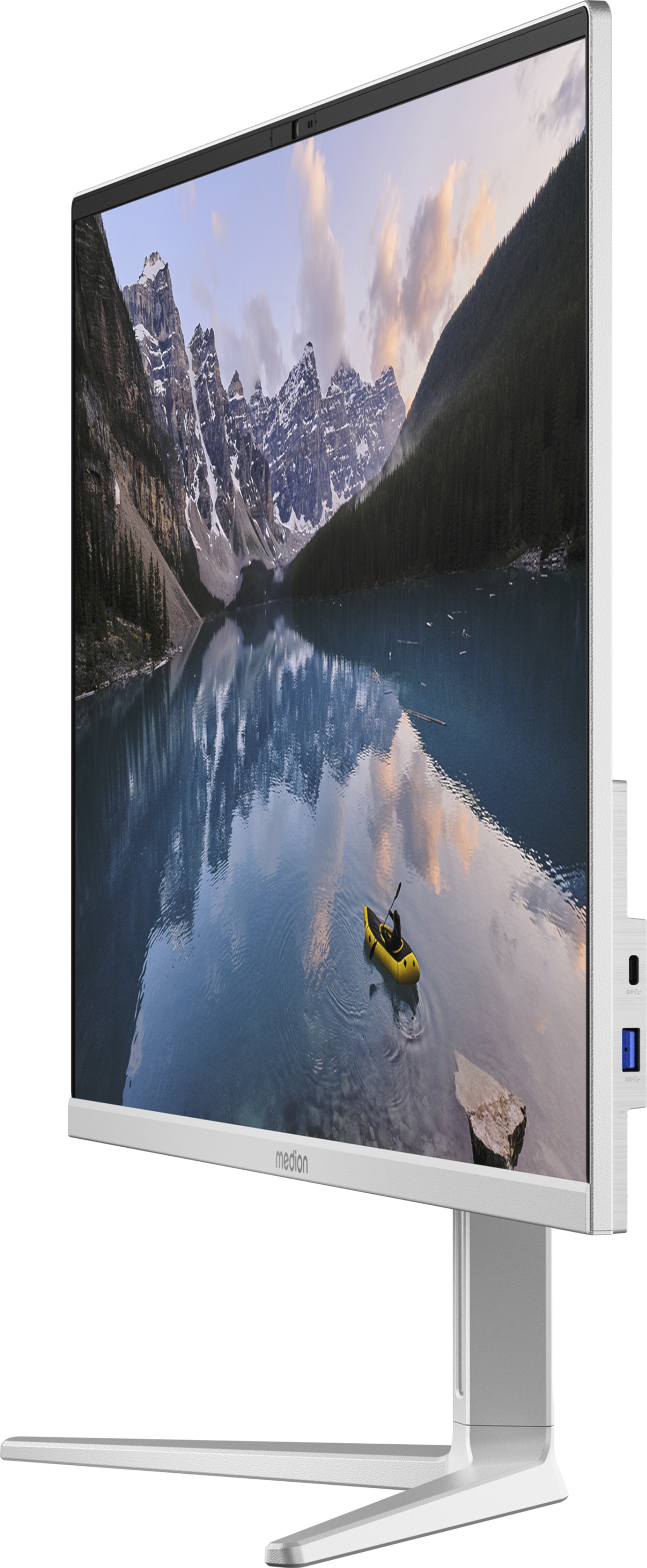 Weißer Computermonitor, der eine malerische Landschaft mit See und Bergen zeigt.