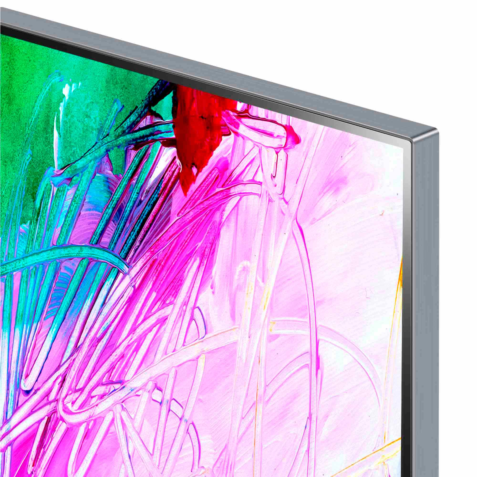 Primer plano de la esquina de una pantalla de TV con arte abstracto colorido y marco plateado.