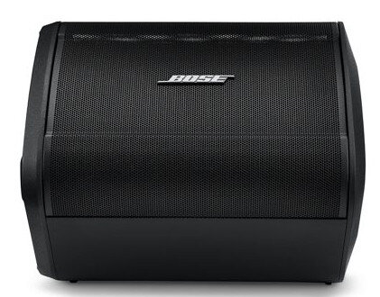 Czarny głośnik Bose z logo Bose, prostokątny kształt z siatkowym przodem.