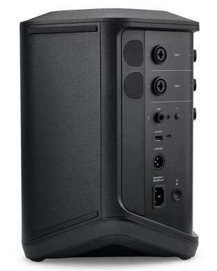 Czarny głośnik z portami wejściowymi i widocznym portem zasilania z tyłu.