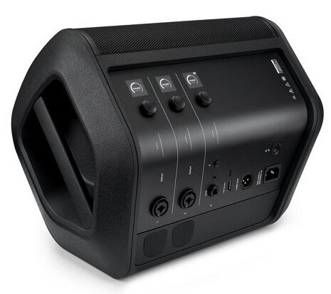 Czarny głośnik audio z kontrolkami. Widok z boku pokazuje tył z wejściami i przyciskami.