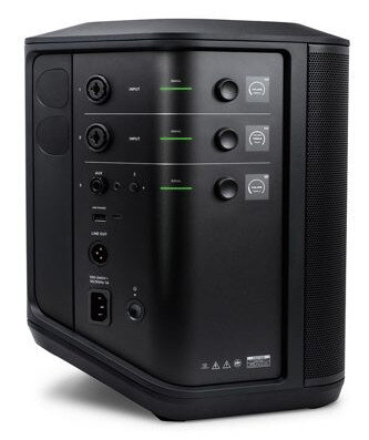 Czarne urządzenie audio z wejściami, wyjściami i elementami sterującymi z boku.