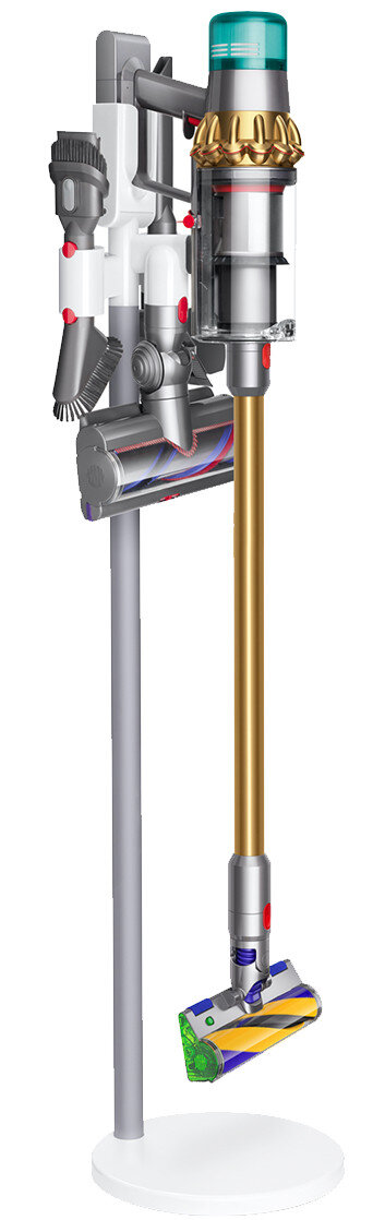 Odkurzacz pionowy z wieloma nasadkami, w kolorystyce złota i srebra.