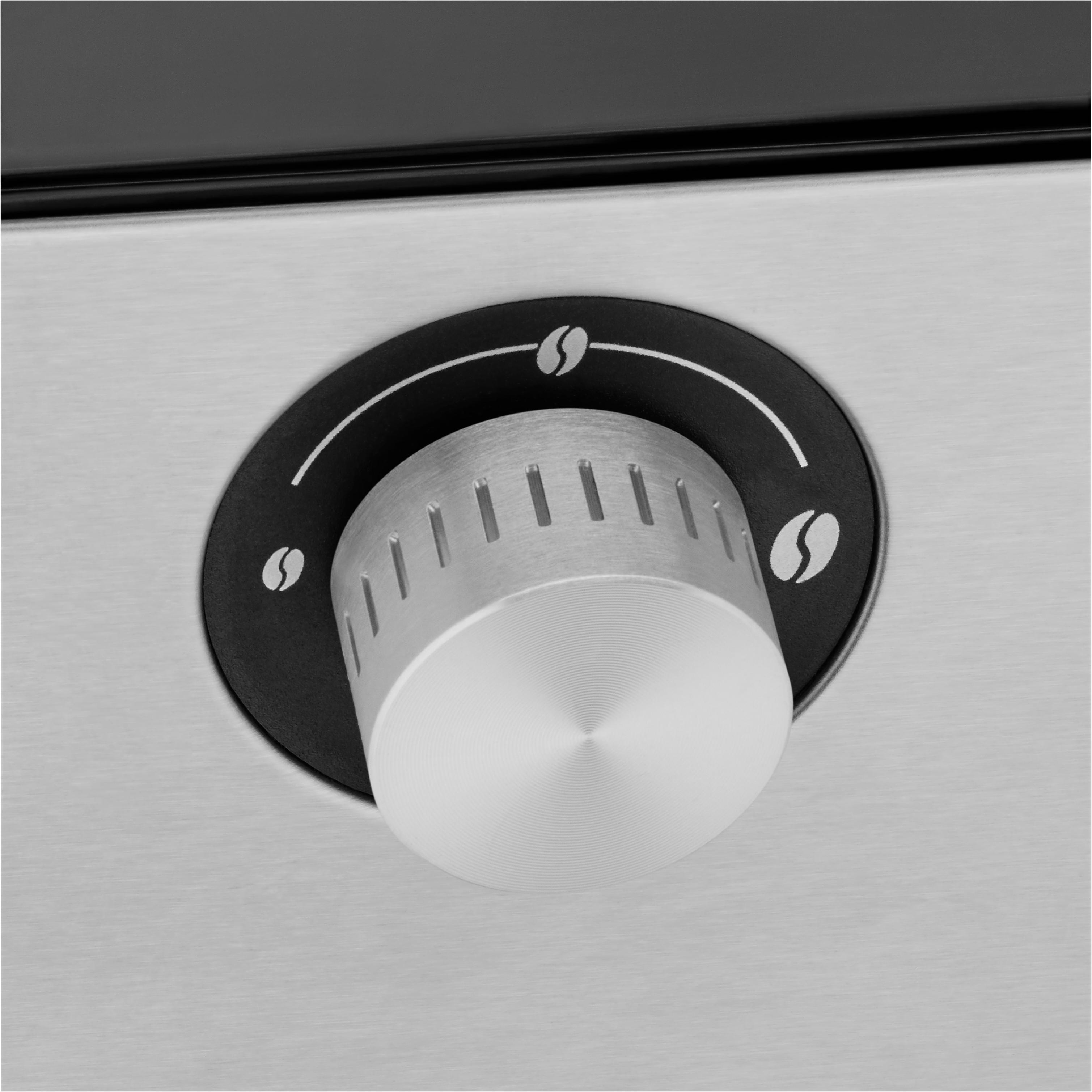 Nahaufnahme des Bedienknopfs einer Kaffeemühle.