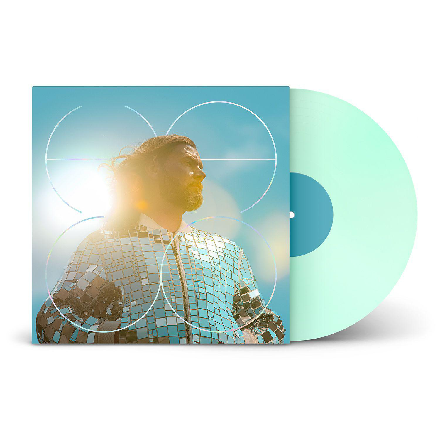 Ein Vinyl-Schallplattenalbum mit einem Mann auf dem Cover. Er trägt eine reflektierende Jacke.