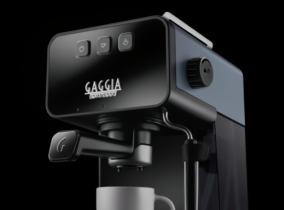 Egy fekete-szürke eszpresszó gép a Gaggia Espresso logóval.