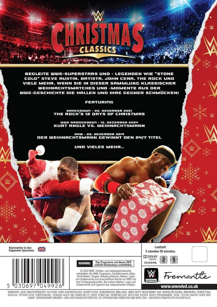 DVD-Cover mit Wrestlern und einem Weihnachtsmann. Rot und weiß mit Text über Wrestling.