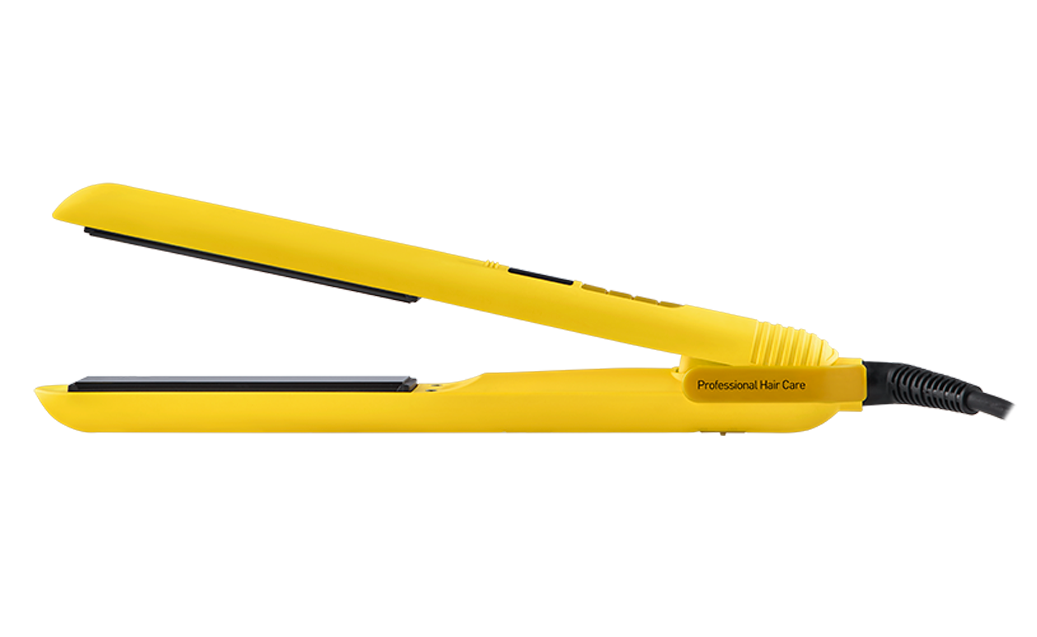 Sarı saç düzleştirici, açık, siyah arka plan üzerinde. Professional Hair Care metni görülüyor.