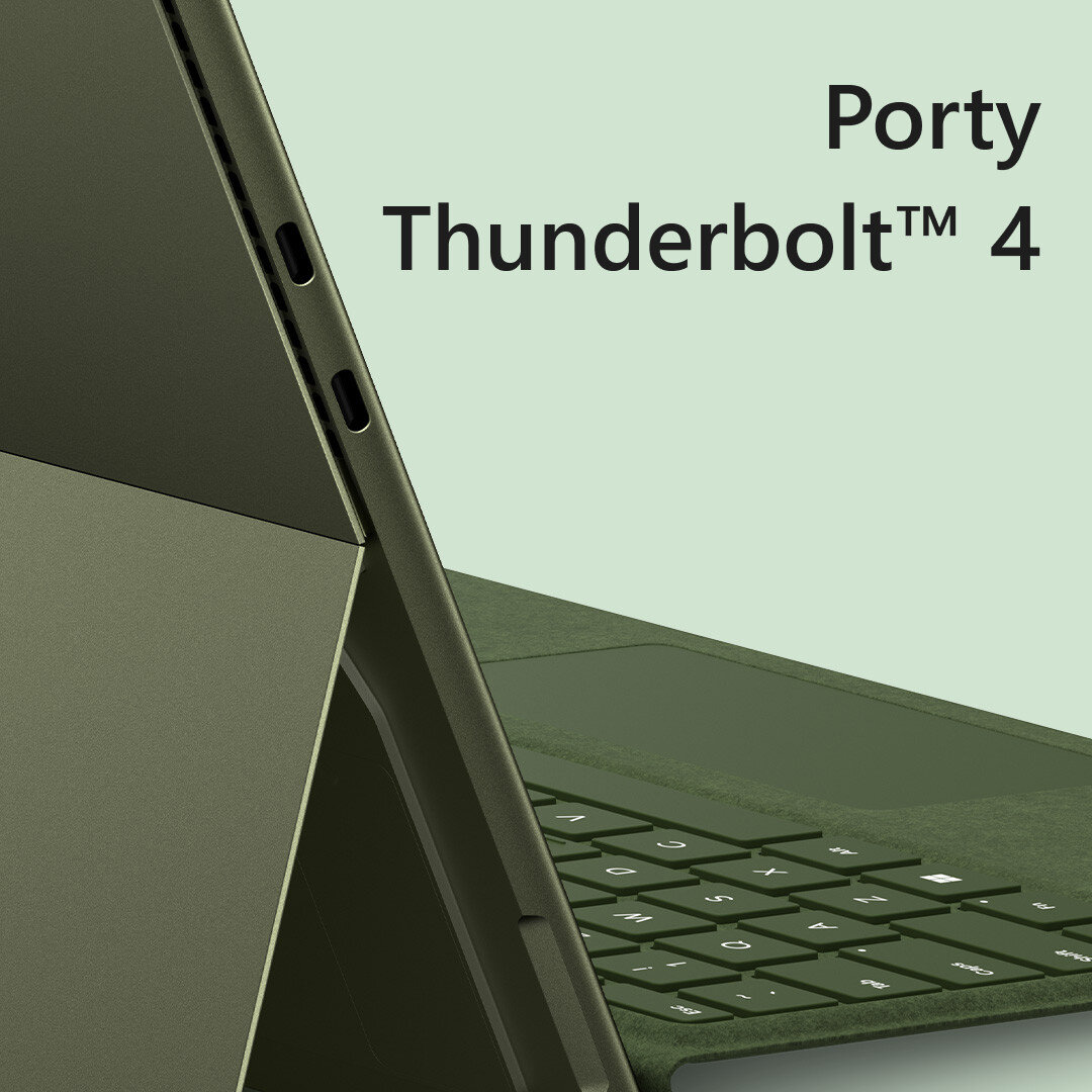 Zielona klawiatura laptopa z tekstem "Porty Thunderbolt 4" na górze.