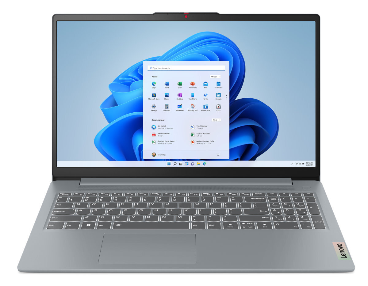 Otwarty laptop z ekranem wyświetlającym pulpit i widoczną klawiaturą.