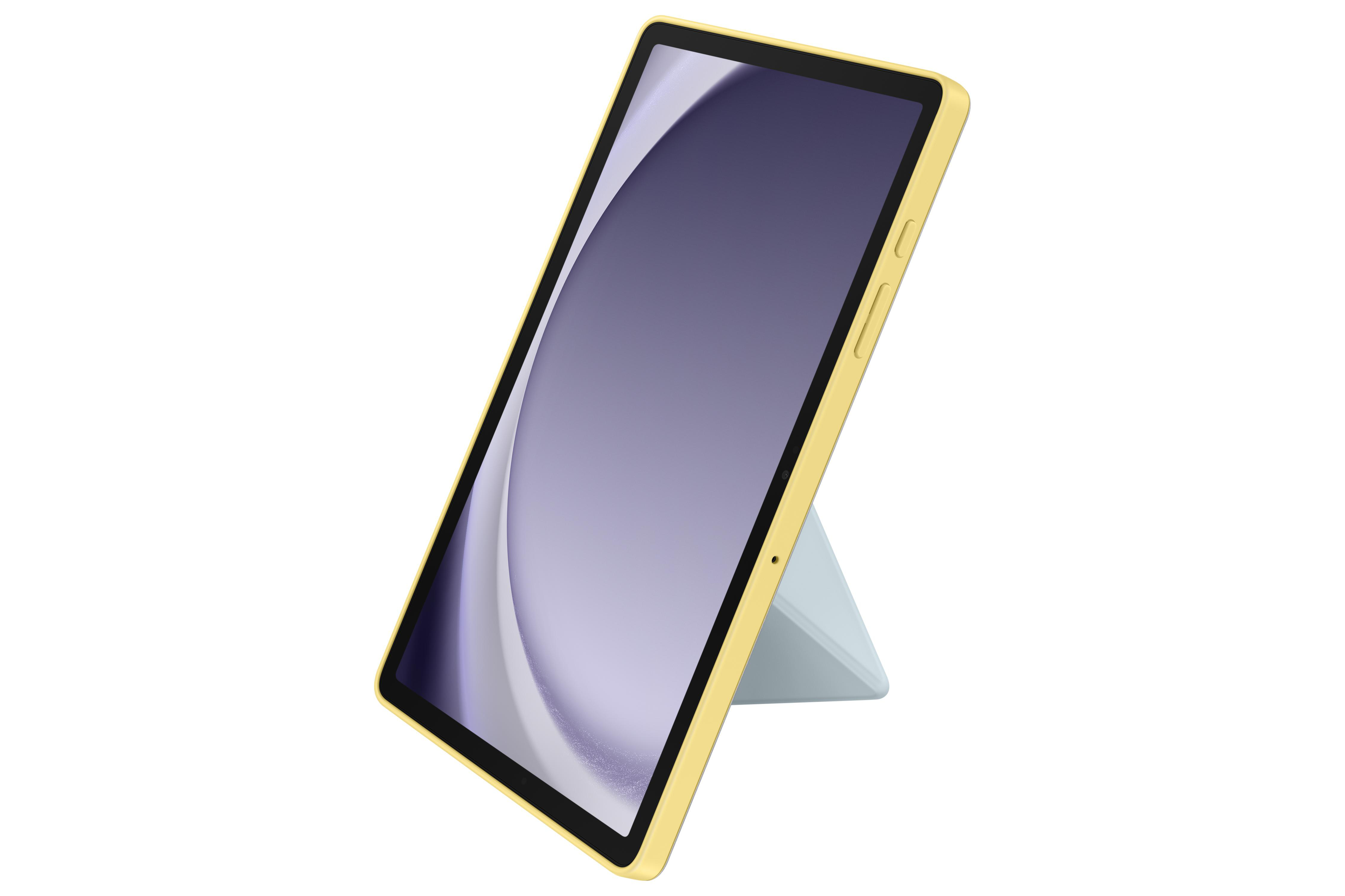 Ein gelbes Tablet mit hellblauem Ständer, schräg gestellt. Der Bildschirm zeigt ein hellviolettes Bild.