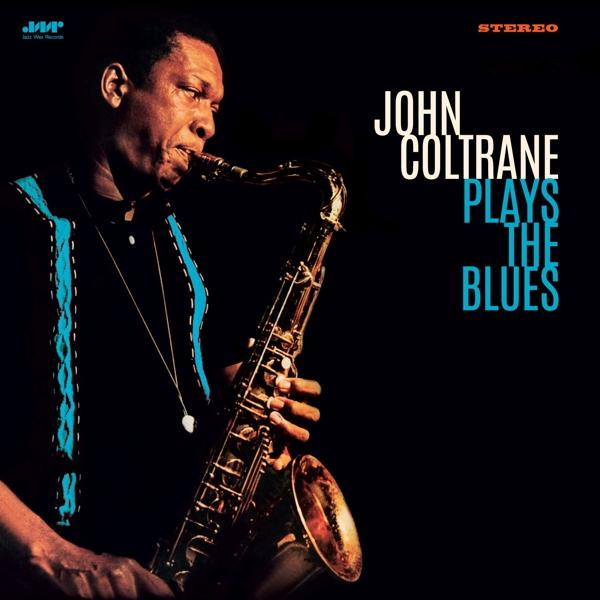 John Coltrane szaxofonozik, lemezborítóval.