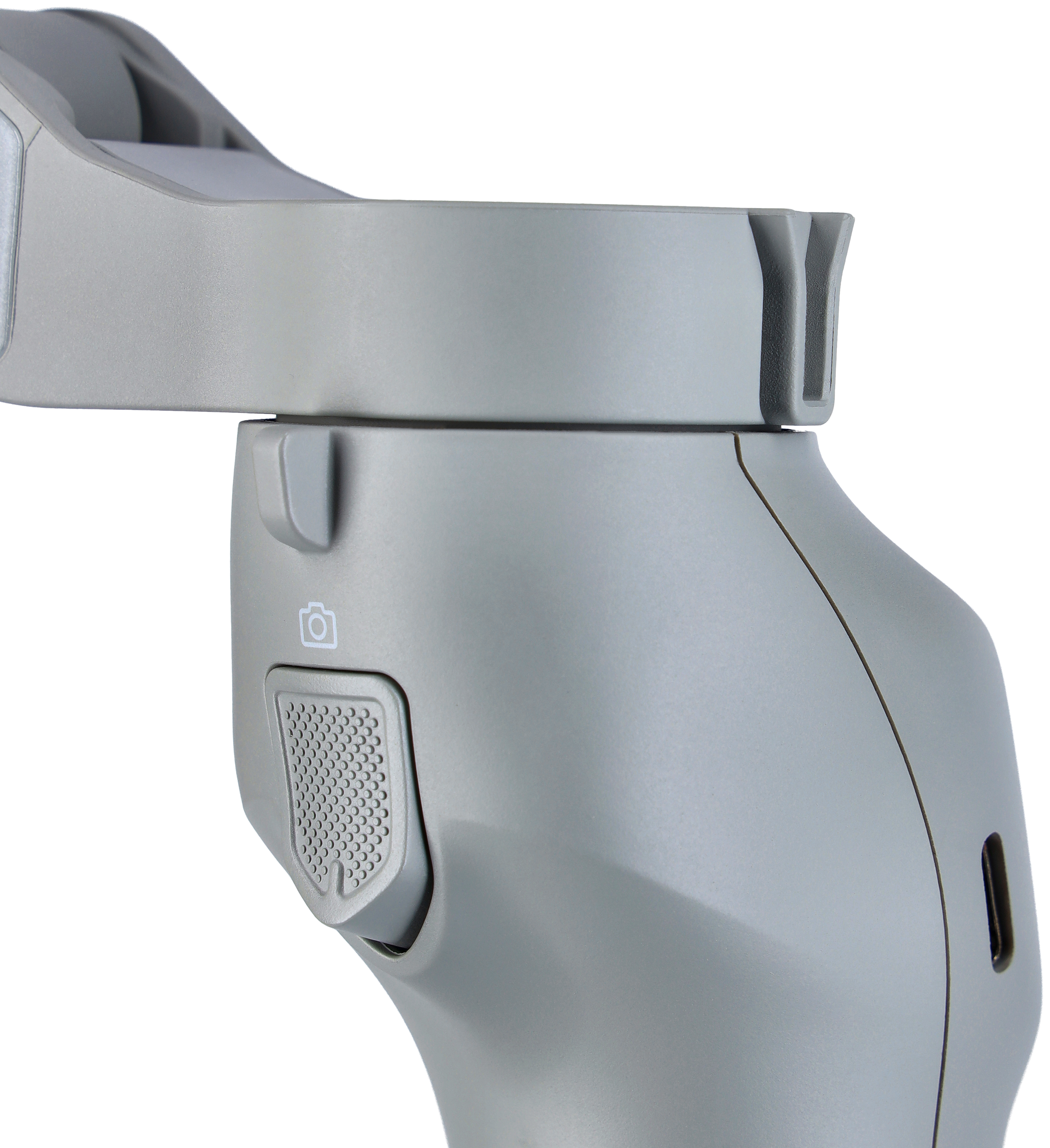 Nahaufnahme eines grauen Gimbals mit einem Knopf und einem Kamerasymbol an der Seite.