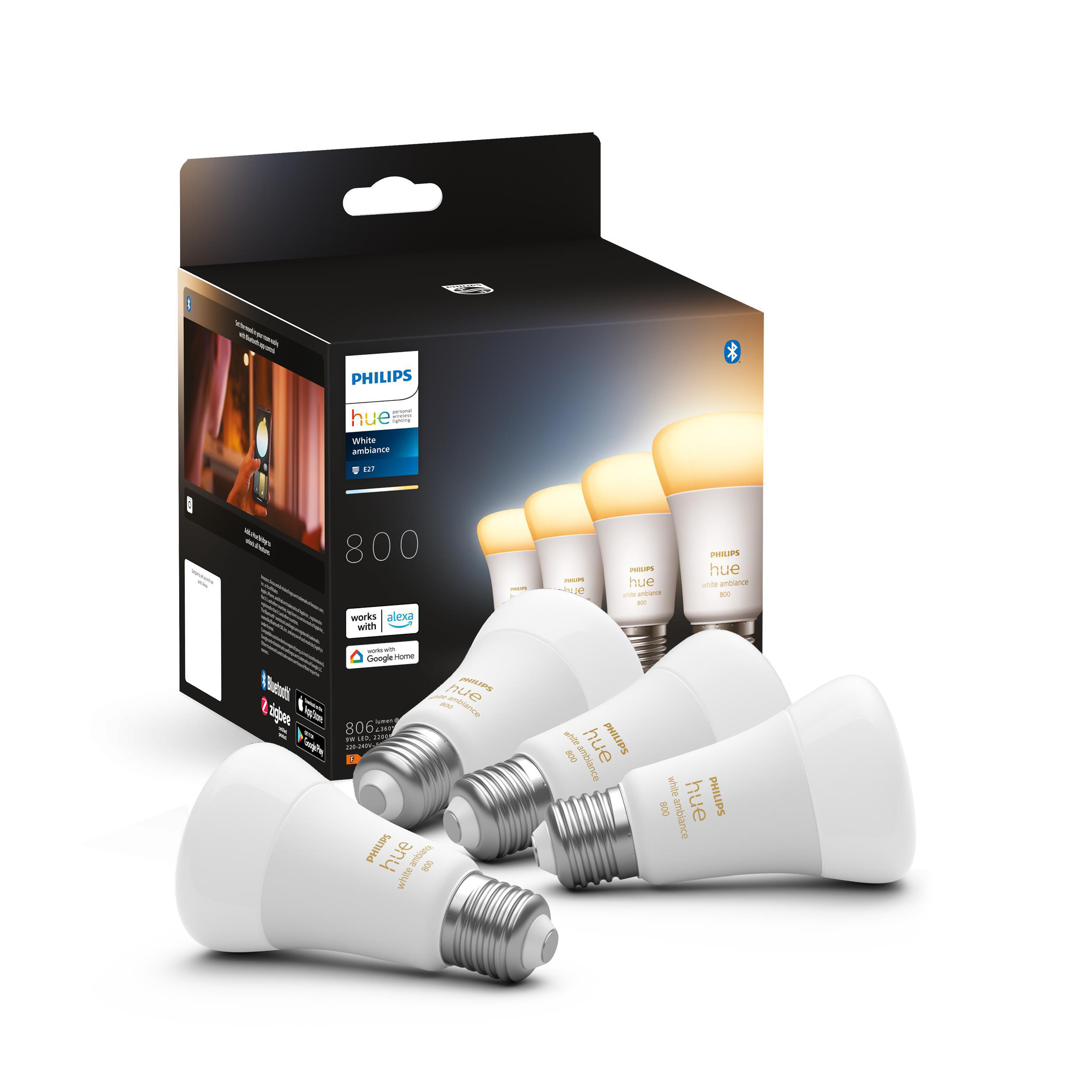 Eine Schachtel mit Philips Hue Smart-Glühbirnen. Vier Glühbirnen sind abgebildet, mit einer Schachtel im Hintergrund.