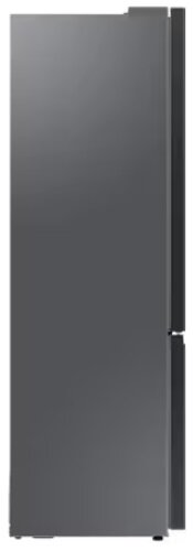 Widok z boku ciemnoszarej lodówki. Widoczne drzwi i uchwyt.