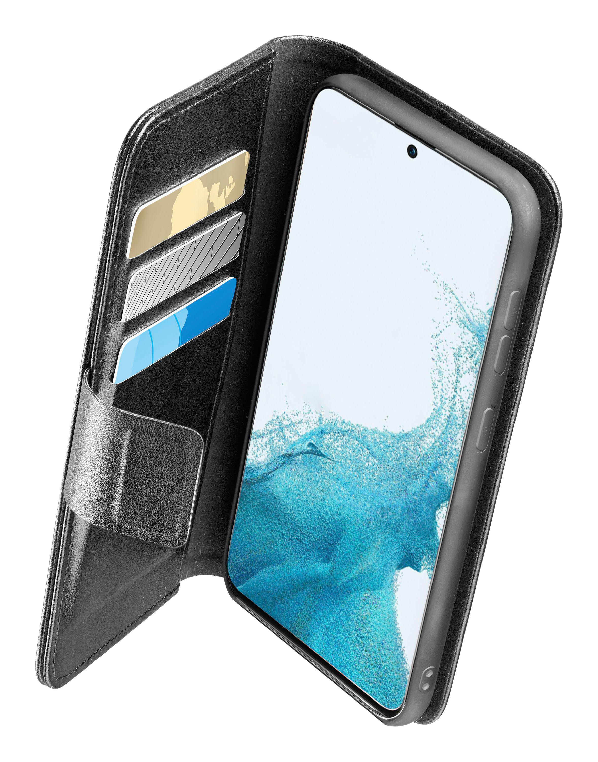 Schwarze Handyhülle offen mit Karten und Telefon darin. Der Bildschirm zeigt ein blaues und weißes Muster.