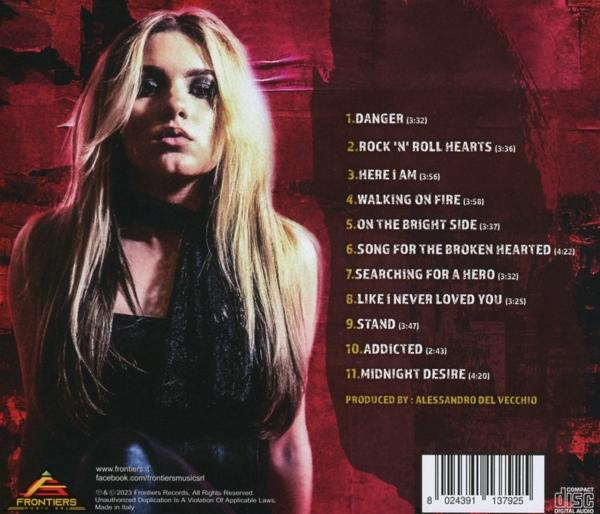 Eine Frau mit langen blonden Haaren auf dem Cover einer CD mit einer Titelliste.