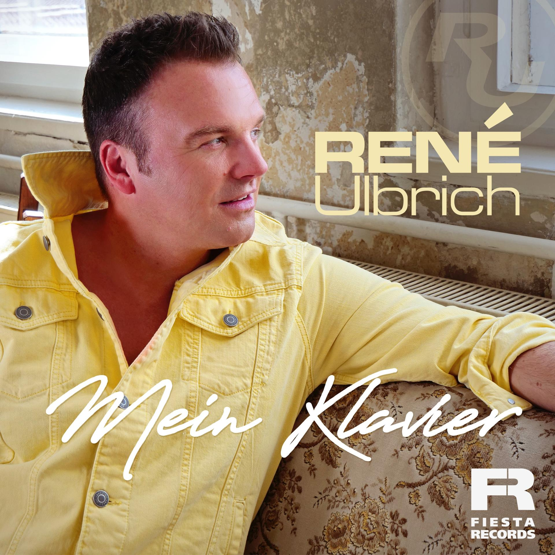 Albumcover, ein Mann in einer gelben Jacke blickt nach links, mit dem Text 'Mein Klavier' und 'René Ulbrich'.