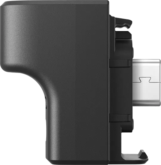 Schwarzer Adapter mit USB-Anschluss, Seitenansicht. Der Adapter hat eine rechteckige Form.