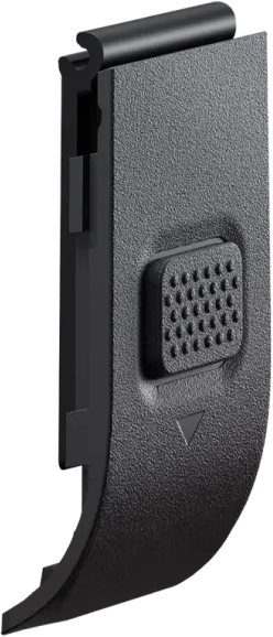 Eine schwarze, strukturierte Kunststoff-Seitenverkleidung mit Knopf und kleinem Pfeil.