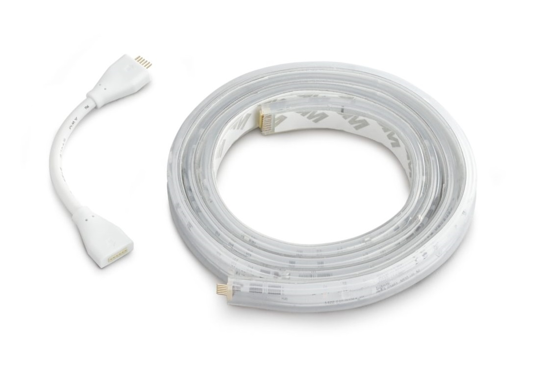 Un cavo bianco con due estremità, accanto a un rotolo arrotolato di luci a striscia LED.