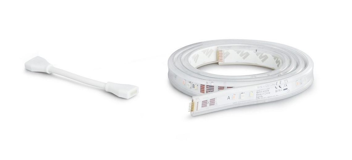 Striscia luminosa LED bianca con connettore bianco a sinistra, arrotolata a destra, su bianco.