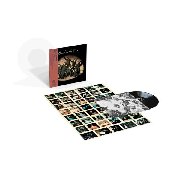 Albumcover mit Vinyl-Schallplatte, "Band on the Run" und eine Fotocollage der Band.