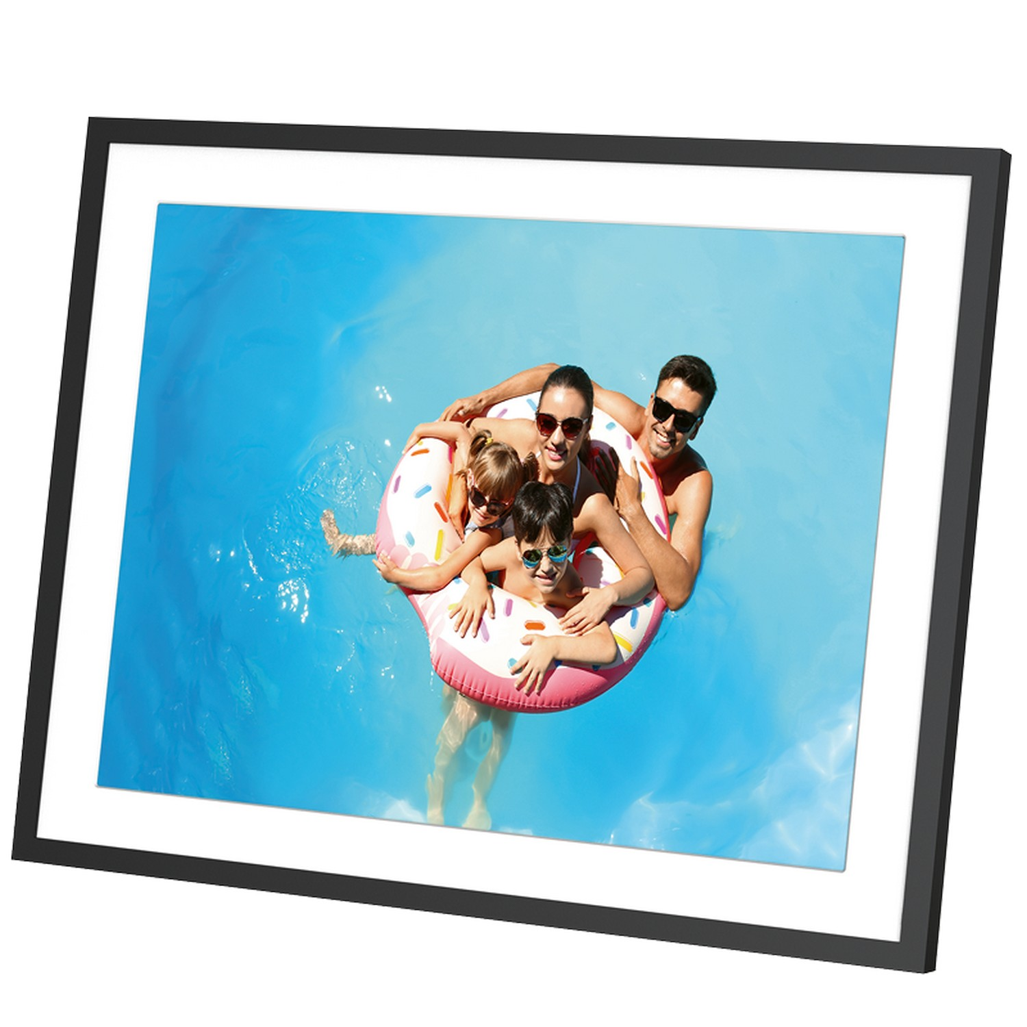 Family in a frame on the water in a donut float. Blue water and a blue sky background.