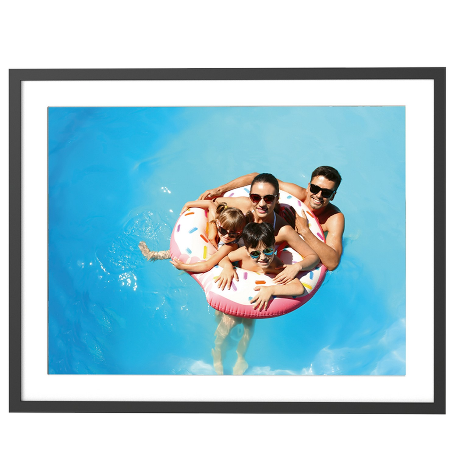 Family in a pool on a donut float. Frame shows the pool and the family, framed in black.