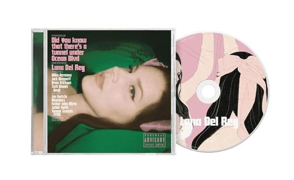 CD-Hülle und -Disc. Die Vorderseite zeigt das Gesicht einer Frau, Titel und Künstlername.