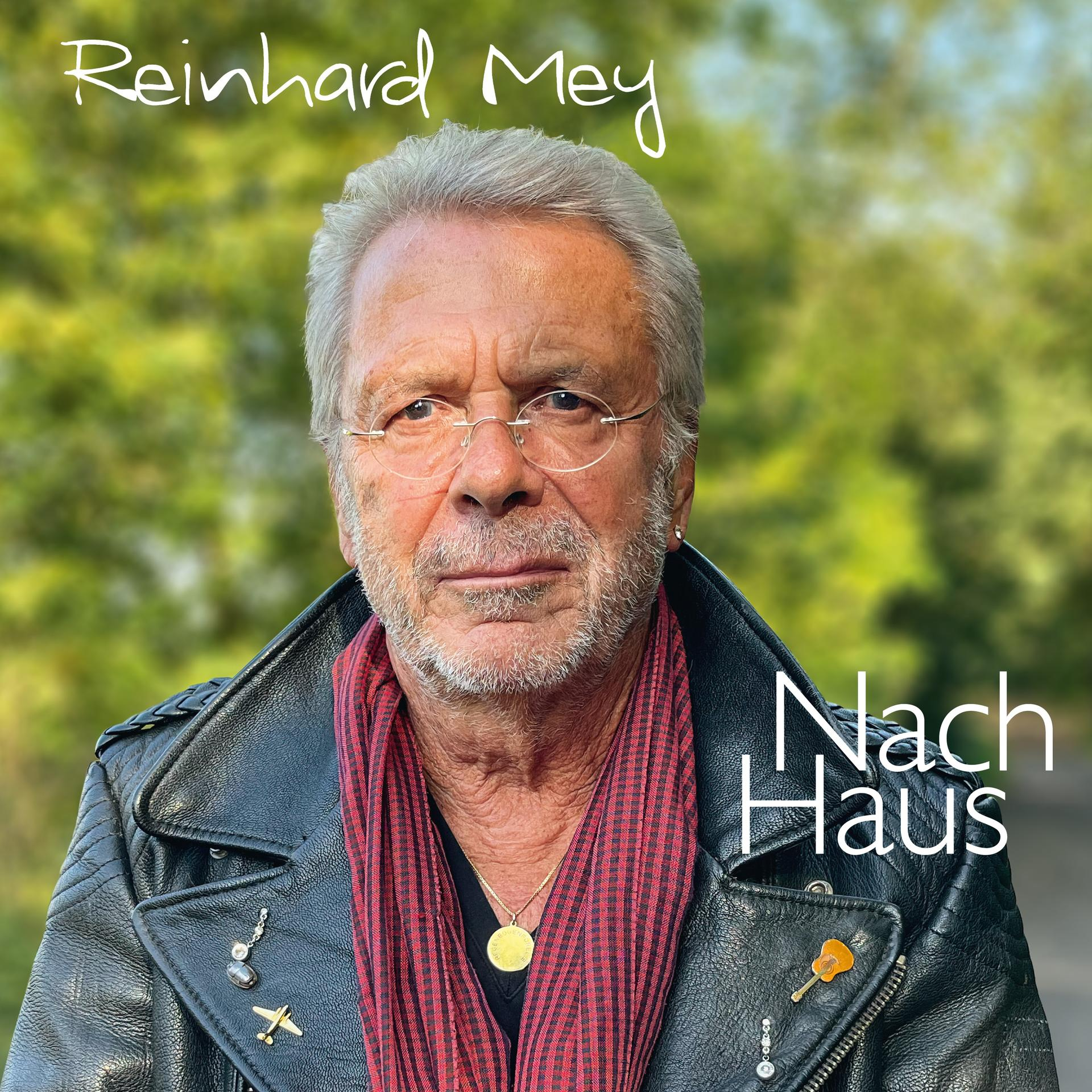 Albumcover mit einem Mann mit Brille und Lederjacke. Text: Reinhard Mey, Nach Haus.