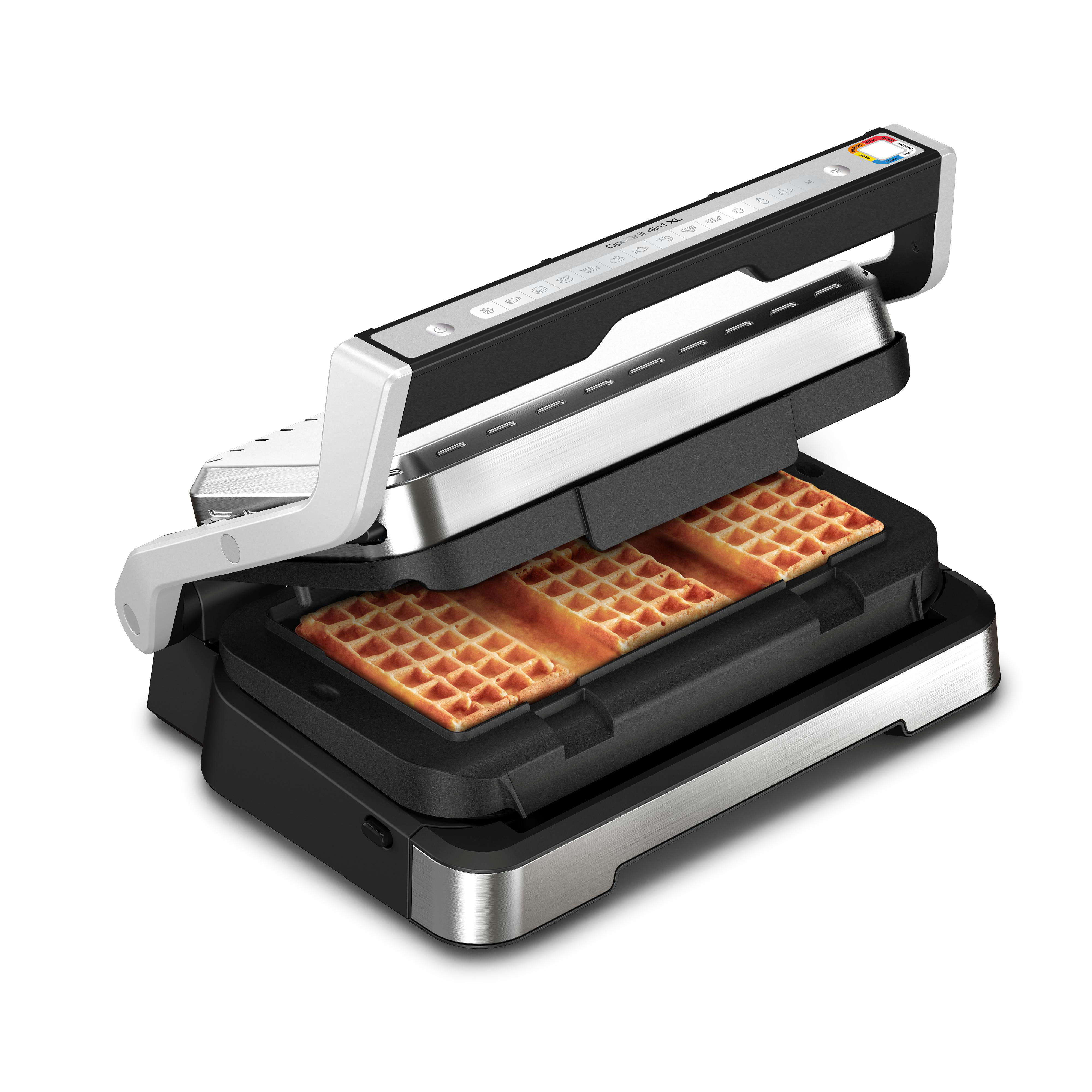 Offener Waffeleisen mit drei Waffeln. Schwarz, Silber und weiße Akzente.