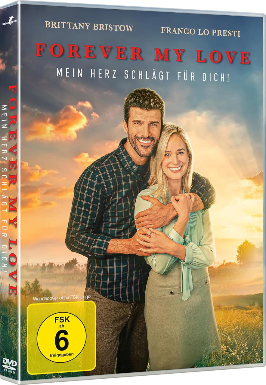DVD-Hülle mit einem Mann und einer Frau, die sich auf einem Feld umarmen, mit Text.
