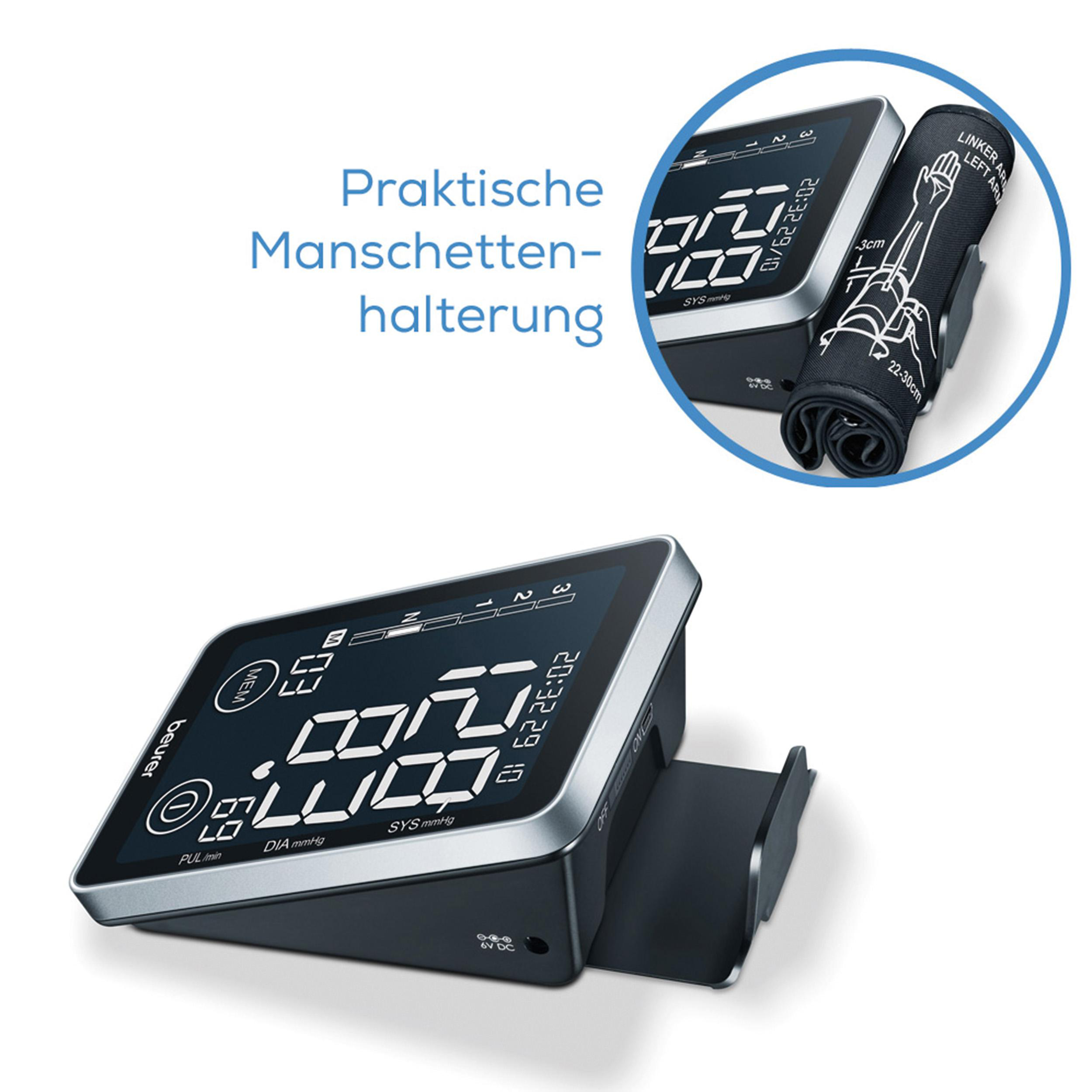 Schwarzes und silbernes Blutdruckmessgerät mit Manschettenhalterung, weißer Hintergrund.