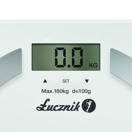 Waga cyfrowa wyświetlająca 0,0 KG, z logo Lucznik i strzałkami do regulacji.