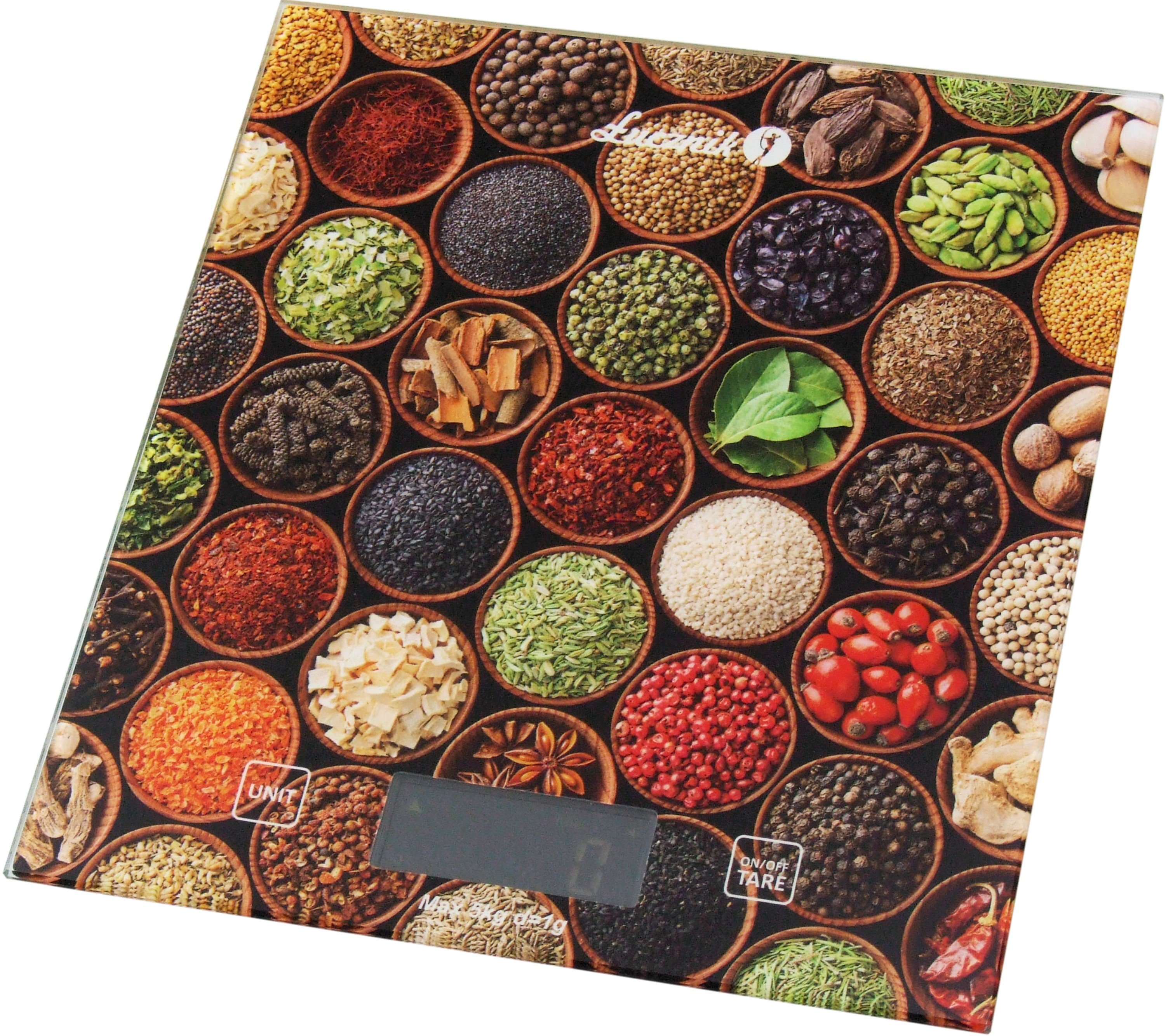 Waga z różnymi przyprawami w małych miskach, wyświetlacz cyfrowy, widok pod kątem.