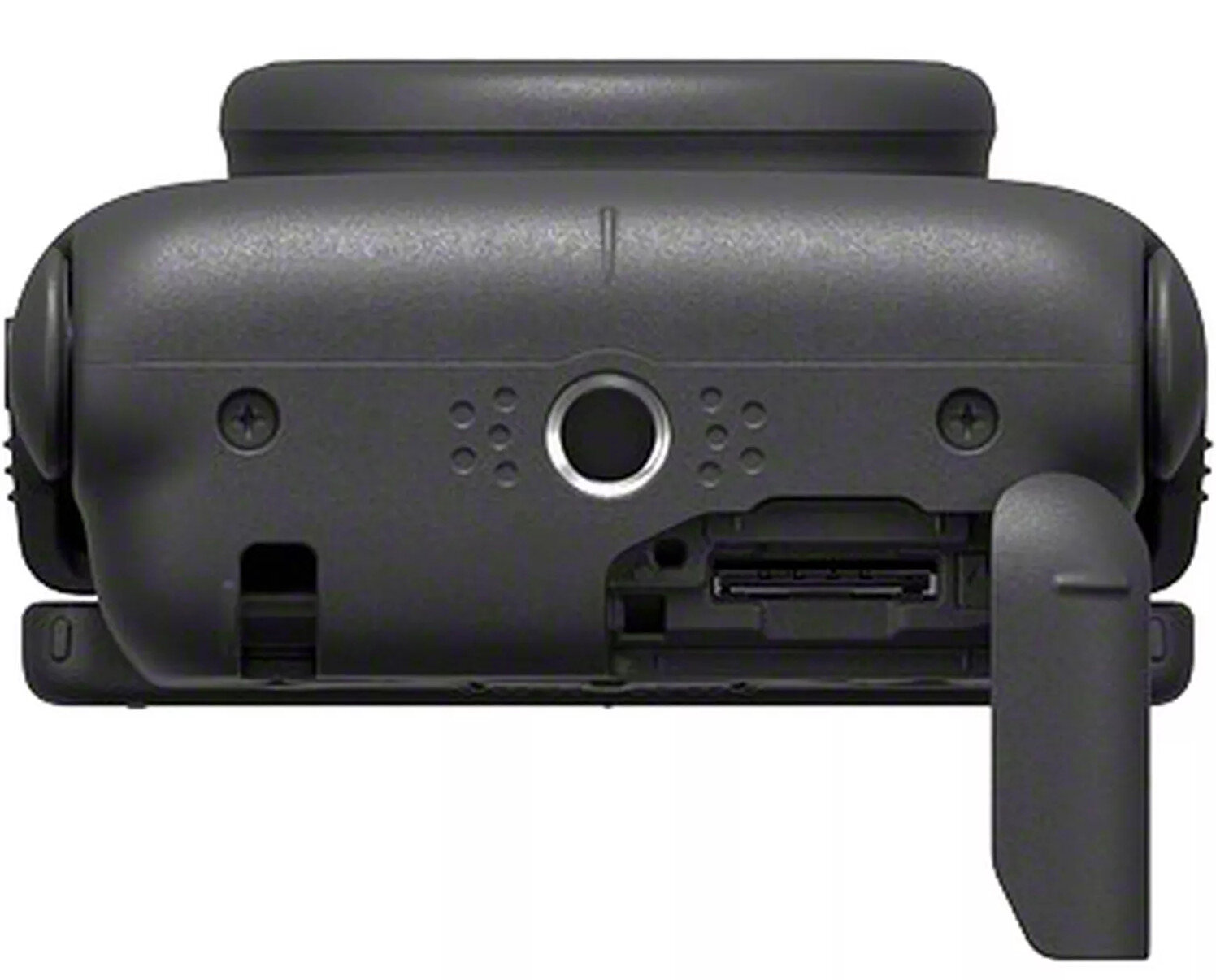 Zbliżenie dolnej części aparatu z portami i osłoną.