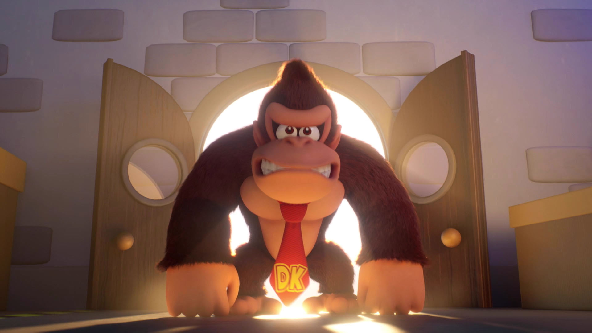Donkey Kong bir kapıda duruyor, üzerinde 'DK' yazan kırmızı bir kravat ve parlak bir arka plan.