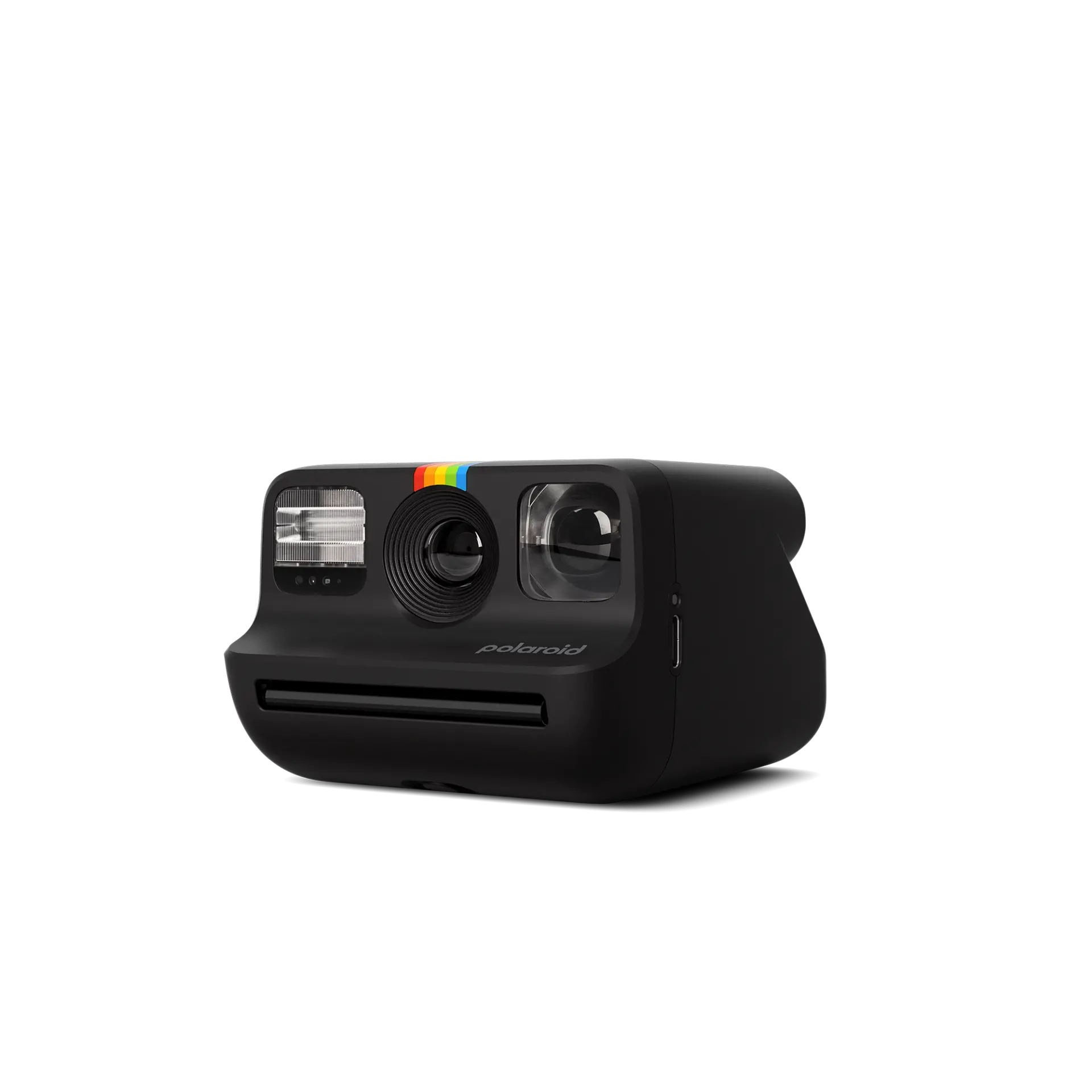 Siyah bir arka plan üzerinde siyah bir Polaroid kamera.