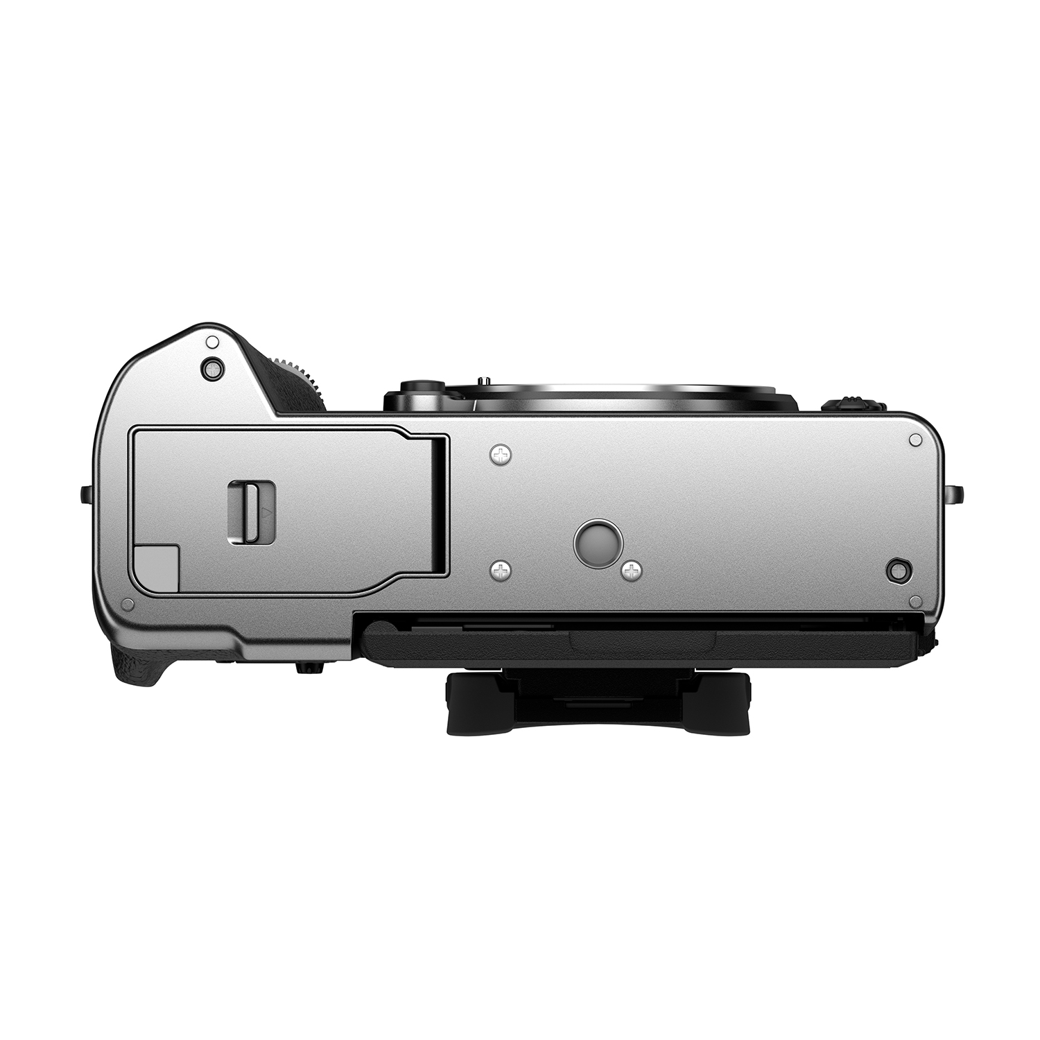 Una fotocamera argentata, vista dall'alto, isolata su bianco. La fotocamera ha un attacco per obiettivo e una ghiera per i tempi di posa.