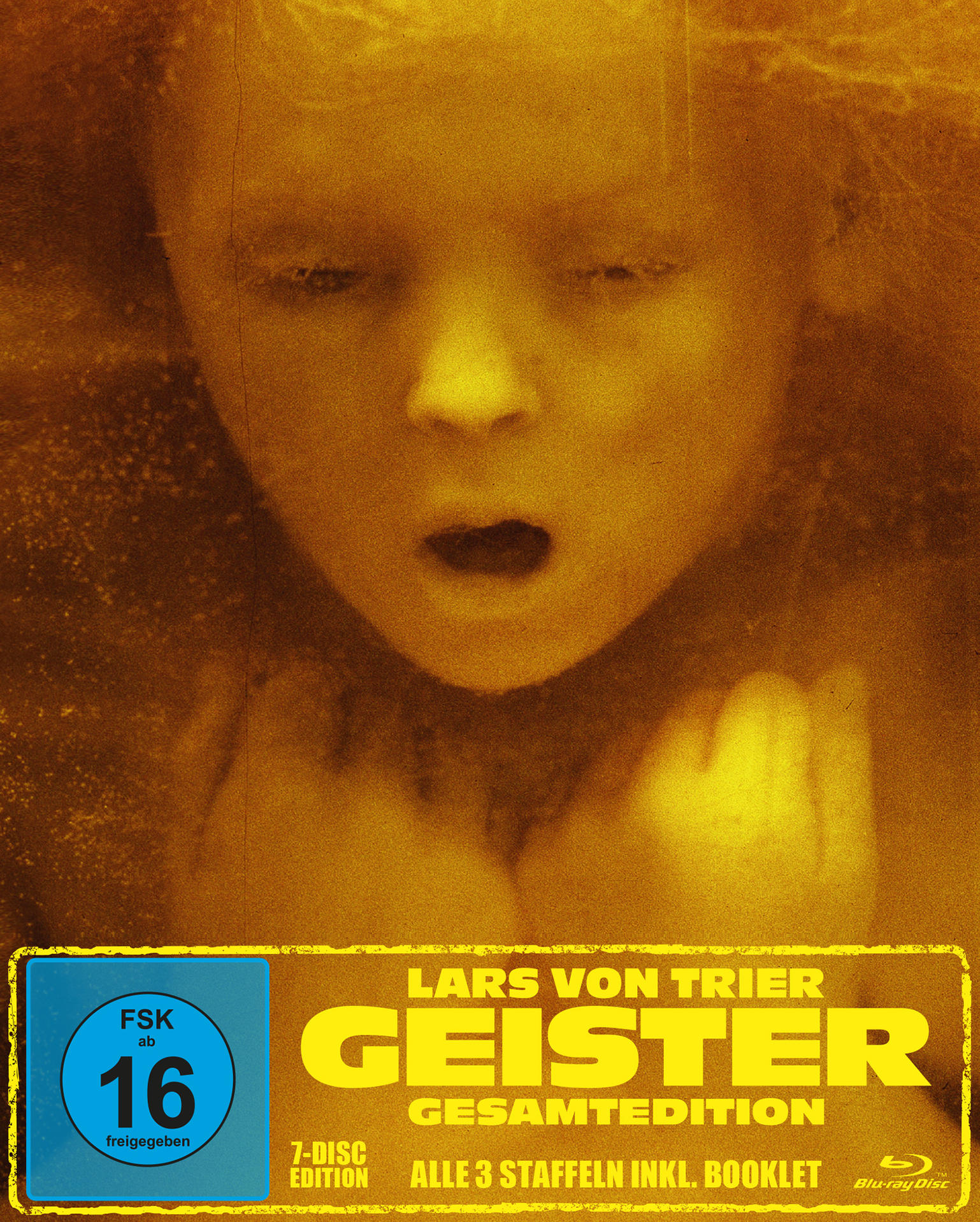 Filmcover: Gesicht eines Kindes, Gelbtöne, offener Mund. Titel: Geister, Gesamtedition. FSK 16.