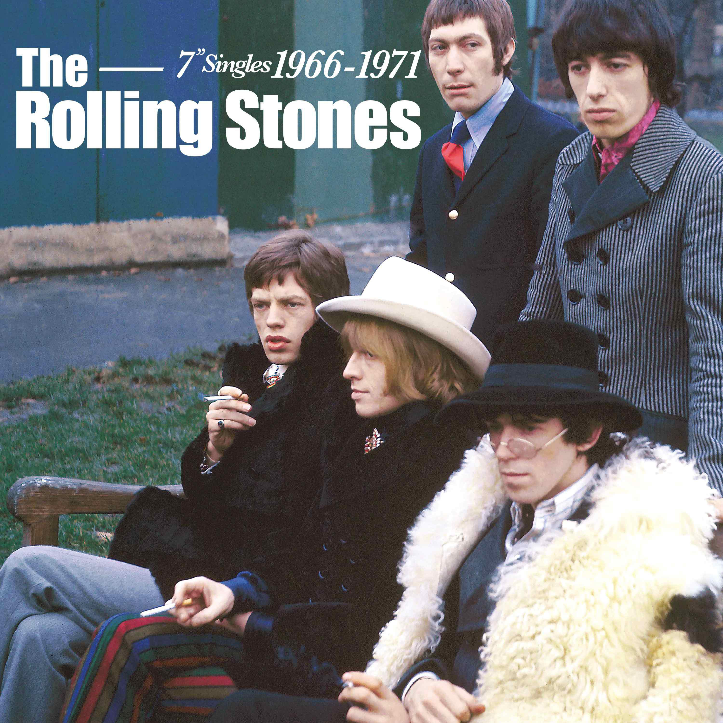 Das Rolling Stones-Albumcover mit der Band, die auf einer Bank sitzt.