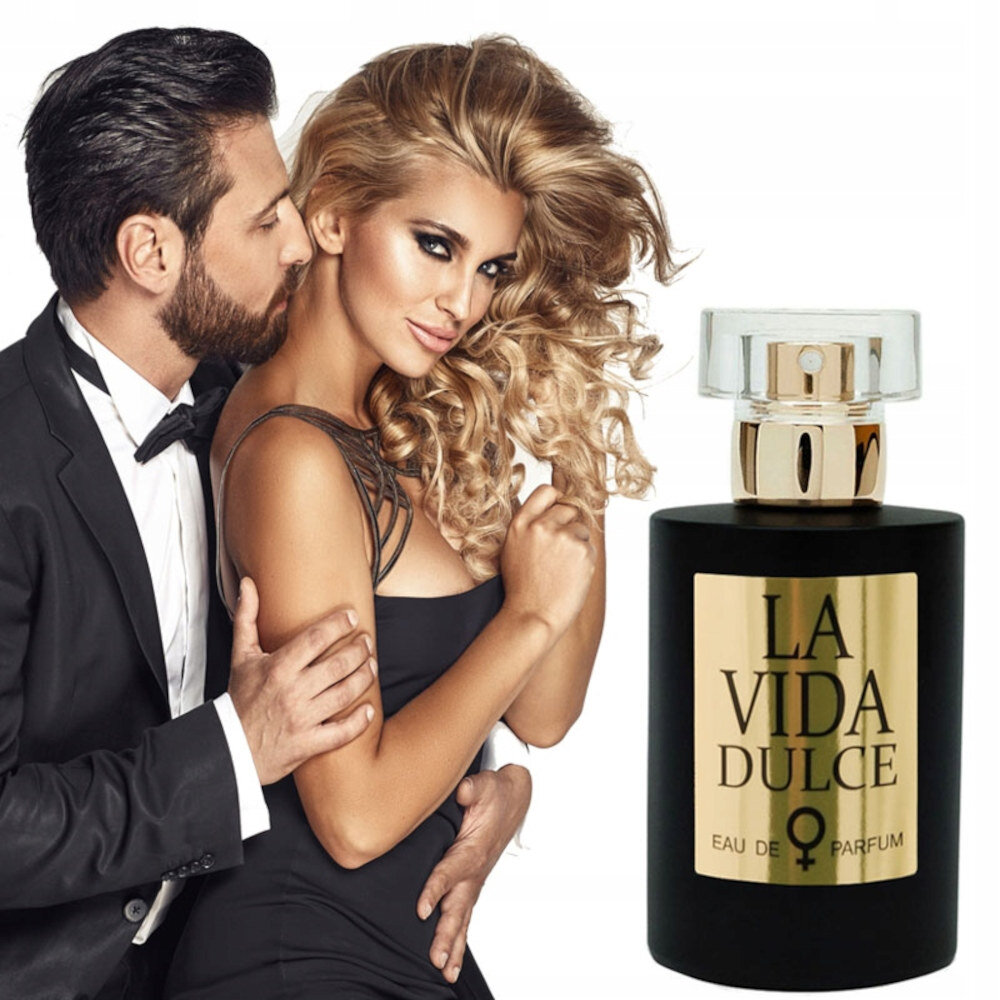 Para obejmująca się, z butelką perfum z napisem "LA VIDA DULCE".