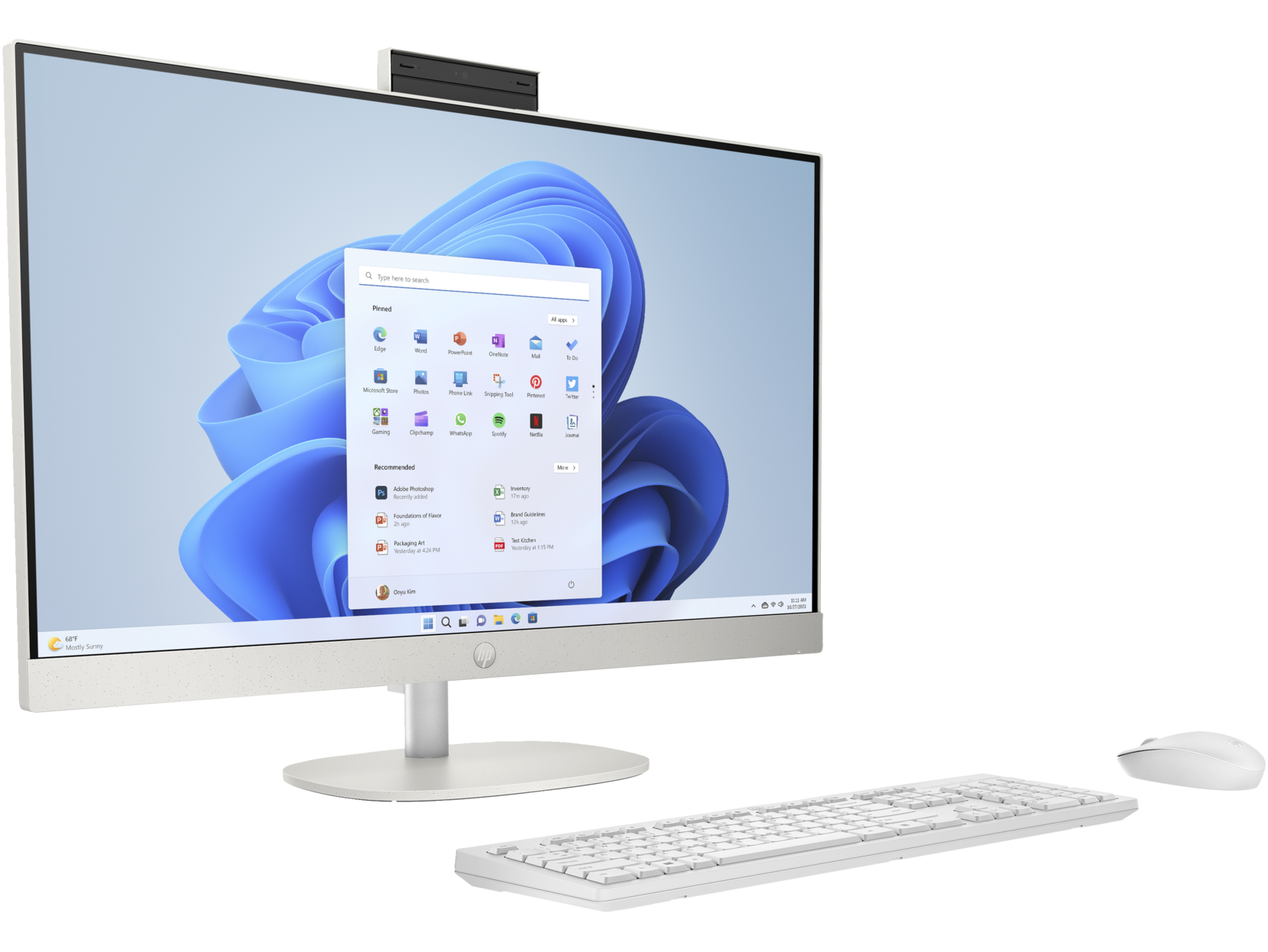 Ordenador blanco todo en uno con pantalla, teclado y ratón.
