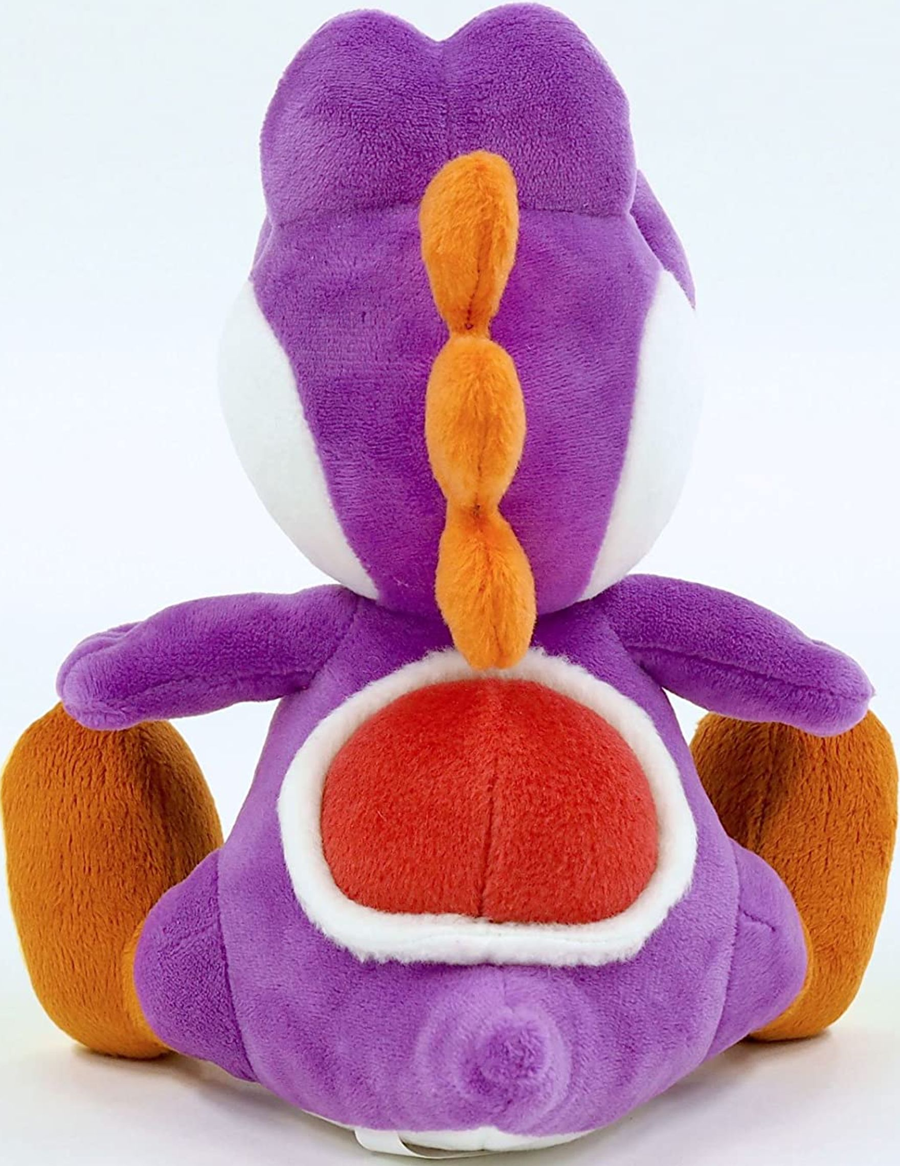 Lila Yoshi-Plüschtier von hinten. Orangefarbene Stacheln und Füße. Weißer Bauch und Augenränder.