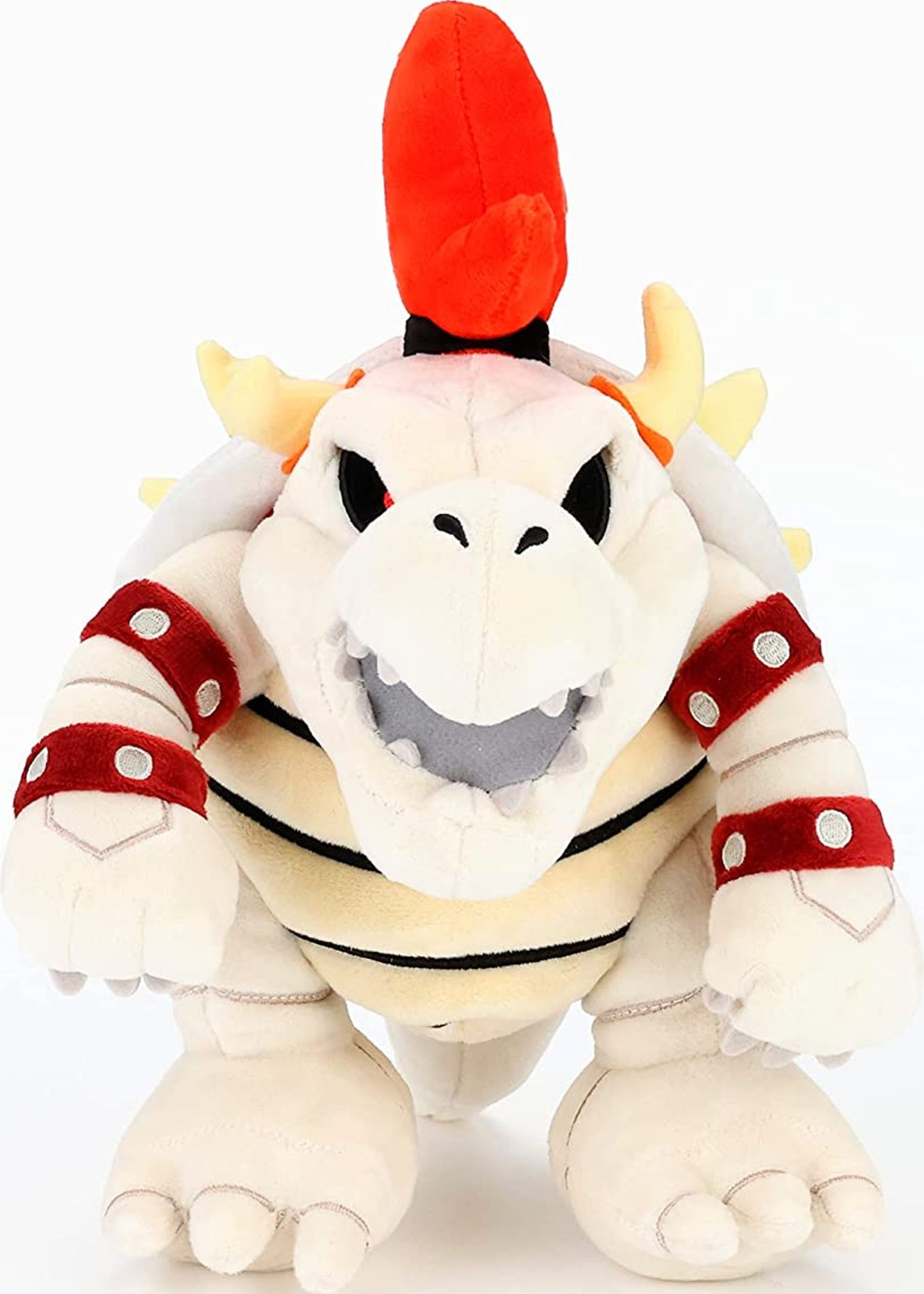 Peluche Dry Bones Bowser, blanc avec des accents rouges, souriant.