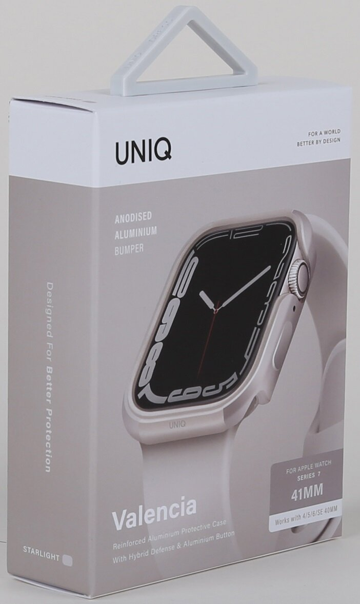 Białe pudełko ze zdjęciem srebrnego Apple Watcha i tekstem 'UNIQ' oraz 'Valencia'.