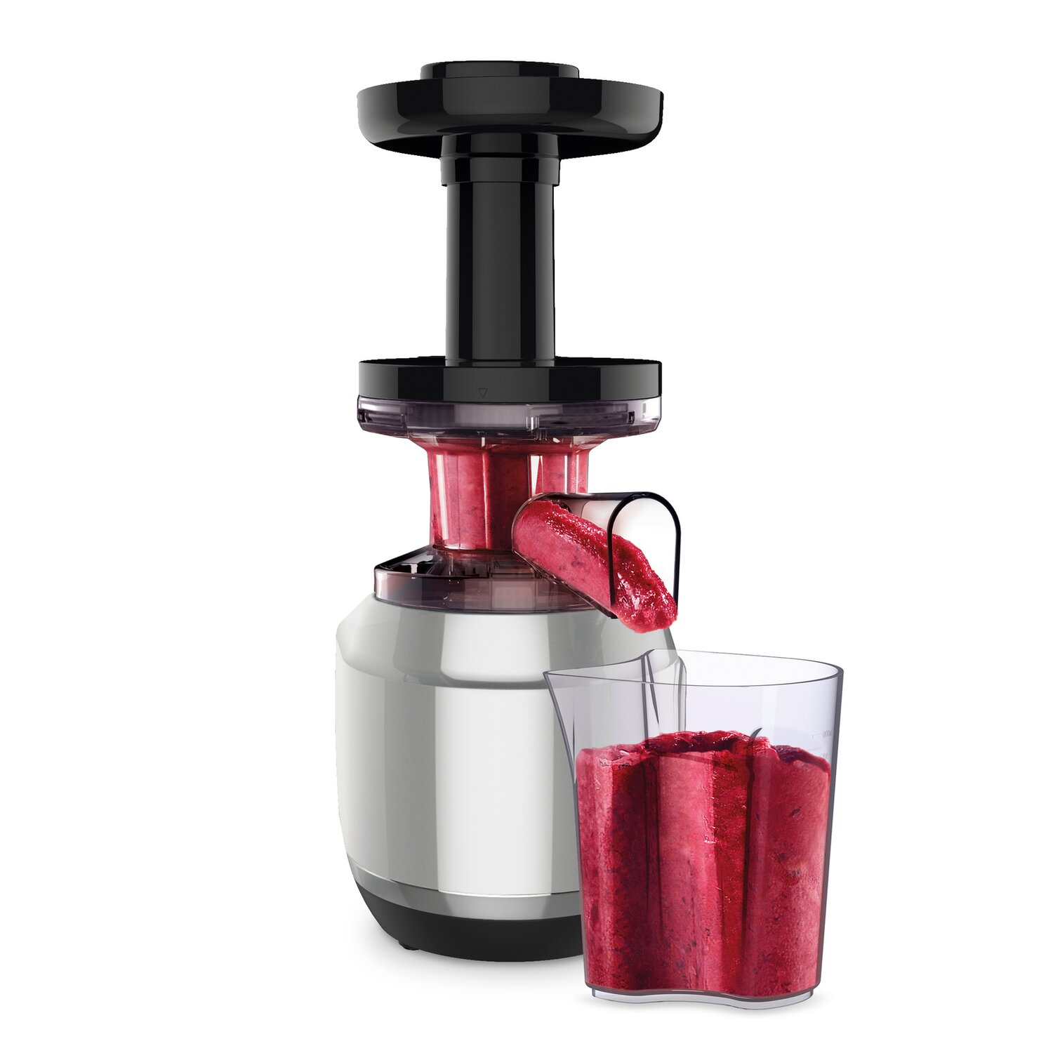 Wyciśnięcie soku z podstawą ze stali nierdzewnej, czarnym blatem i szklanką soku.